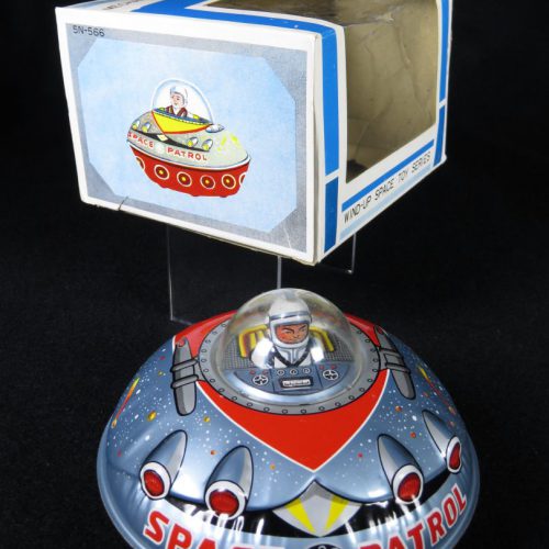 Antique Vintage Space Patrol Flying Saucer - T.T, Takatoku – Japan Tin Lithograph Friction Powered UFO with Astronaut Toy For Sale